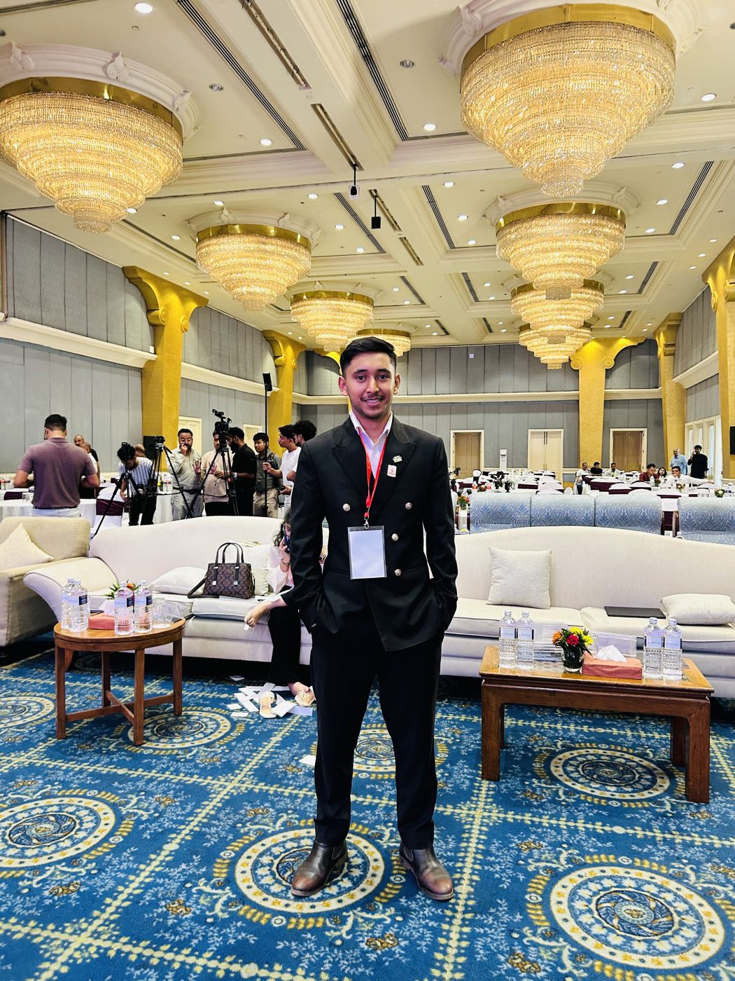 Bishal Dahal at a conference in a ballroom